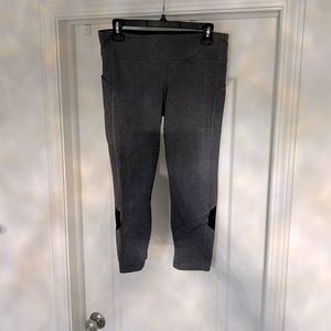 Gray n black Lululemon capris with two pockets and zipper pocket hardly worn